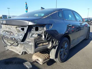 2019 Kia Optima LX with VIN 5XXGT4L36KG292905, listed as a IAAI auction lot 42011723 with 113,553 mi miles. Bid and sale history available at carsss.com. Image 4.