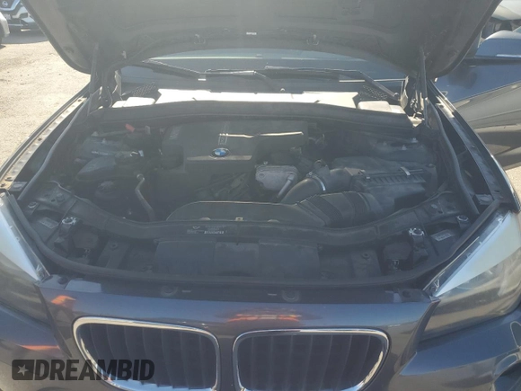 2013 BMW X1 xDrive28i with VIN WBAVL1C52DVR91167, listed as a Copart auction lot 49090395 with 74,323 mi miles and Clean Title. Bid and sale history available at carsss.com. Image 12.