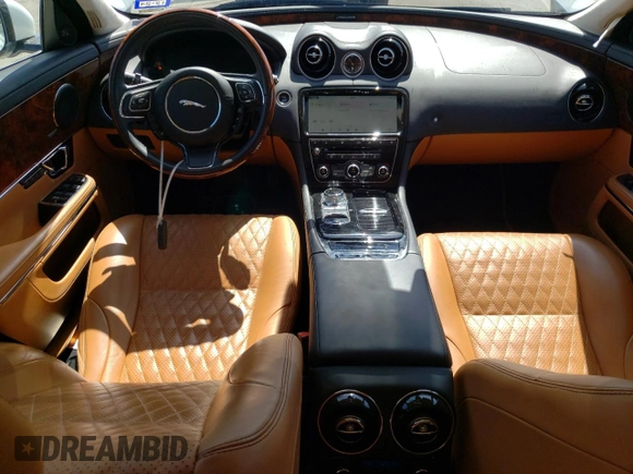 2019 Jaguar XJ Portfolio with VIN SAJWA2G72K8W21087, listed as a Copart auction lot 66017344 with 22,671 mi miles and Salvage Title. Bid and sale history available at DreamBid. Image 8.