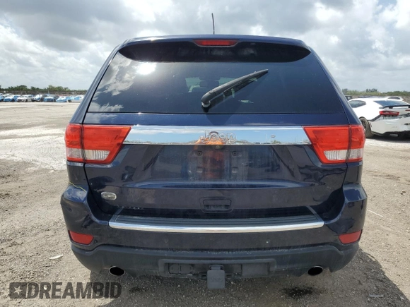 2013 Jeep Grand Cherokee Overland with VIN 1C4RJECT0DC533848, listed as a Copart auction lot 51319385 with 181,436 mi miles and Salvage Title. Bid and sale history available at carsss.com. Image 6.