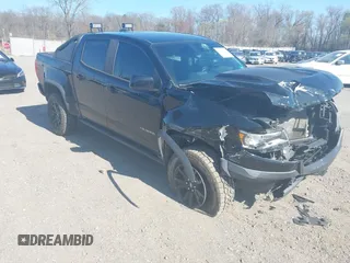 2018 Chevrolet Colorado 4WD ZR2 z VIN 1GCGTEEN6J1208922, wystawiony jako IAAI lot #41999704 z przebiegiem 80 847 mil mil oraz . Historia ofert i sprzedaży dostępna na DreamBid. Obrazek 1.