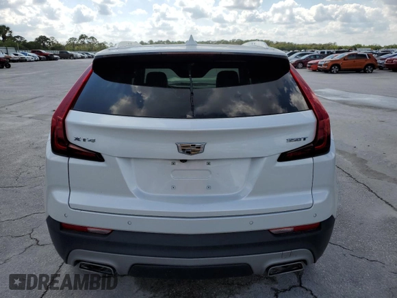 2020 Cadillac XT4 FWD Premium Luxury z VIN 1GYFZCR49LF118146, wystawiony jako Copart lot #44537995 z przebiegiem Nie podano mil oraz Nie do naprawy. Historia ofert i sprzedaży dostępna na DreamBid. Obrazek 6.
