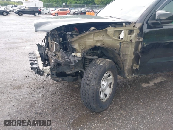 2018 Toyota Tacoma SR with VIN 5TFSX5EN1JX062523, listed as a IAAI auction lot 42334816 with 56,994 mi miles and . Bid and sale history available at DreamBid. Image 6.