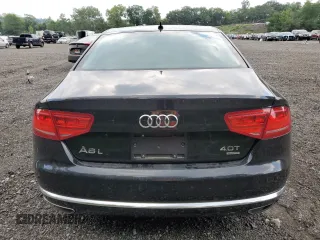 2014 Audi A8 4.0T with VIN WAUR2AFD5EN003923, listed as a Copart auction lot 65389025 with 97,833 mi miles and Salvage title. Bid and sale history available at DreamBid. Image 6.