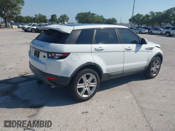 2015 Land Rover Range Rover Evoque Pure Premium z VIN SALVR2BG0FH964683, wystawiony jako IAAI lot #42016766 z przebiegiem 94 942 mil mil oraz . Historia ofert i sprzedaży dostępna na DreamBid. Obrazek 4.