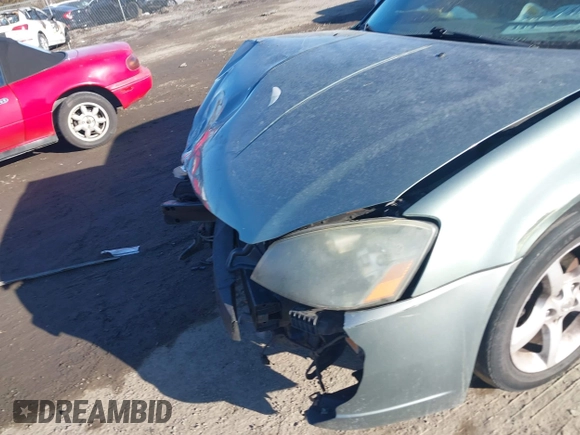 2005 Nissan Altima SE with VIN 1N4BL11E65C118744, listed as a IAAI auction lot 41390942 with 1 mi miles. Bid and sale history available at carsss.com. Image 6.