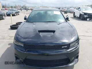 2021 Dodge Charger R/T with VIN 2C3CDXCT4MH651945, listed as a IAAI auction lot 41861896 with 25,569 mi miles and . Bid and sale history available at carsss.com. Image 12.