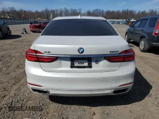 2016 BMW 7 Series 750i xDrive с VIN WBA7F2C57GG418537, выставлен на аукционе Copart как лот 48028195 с пробегом 110 714 миль миль и Списание • Salvage title. История ставок и продаж доступна на DreamBid. Изображение 6.