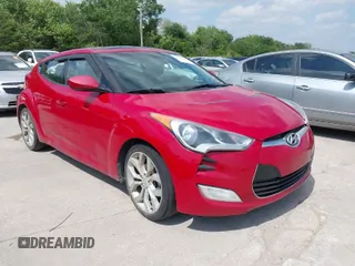 2013 Hyundai Veloster RE:MIX with VIN KMHTC6AD5DU156831, listed as a IAAI auction lot 42051205 with 145,443 mi miles and . Bid and sale history available at DreamBid. Image 1.