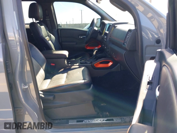 2023 Nissan Frontier SV with VIN 1N6ED1EK2PN633278, listed as a IAAI auction lot 41854671 with 59,549 mi miles and . Bid and sale history available at DreamBid. Image 5.