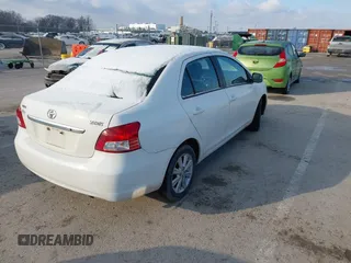 2009 Toyota Yaris z VIN JTDBT903991341371, wystawiony jako IAAI lot #41472292 z przebiegiem 205 596 mil mil oraz . Historia ofert i sprzedaży dostępna na DreamBid. Obrazek 4.