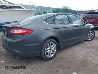 2016 Ford Fusion SE with VIN 3FA6P0H78GR164748, listed as a IAAI auction lot 42209658 with 102,927 mi miles and . Bid and sale history available at DreamBid. Image 4.