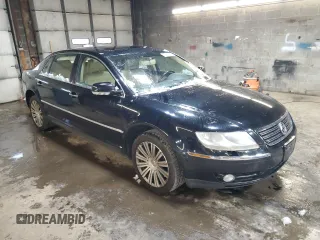 2005 Volkswagen Phaeton V8 z VIN WVWAF63D058000156, wystawiony jako Copart lot #83557884 z przebiegiem 173 284 mil mil oraz Szkody całkowita. Historia ofert i sprzedaży dostępna na DreamBid. Obrazek 4.