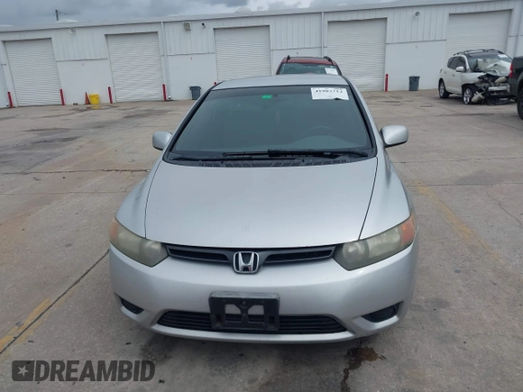 2006 Honda Civic Cpe LX with VIN 2HGFG12606H568106, listed as a IAAI auction lot 41983712 with 196,957 mi miles. Bid and sale history available at carsss.com. Image 12.
