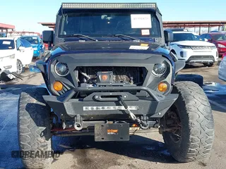 2008 Jeep Wrangler Unlimited Rubicon with VIN 1J8GA69158L616452, listed as a IAAI auction lot 41391875 with 91,143 mi miles and . Bid and sale history available at DreamBid. Image 13.