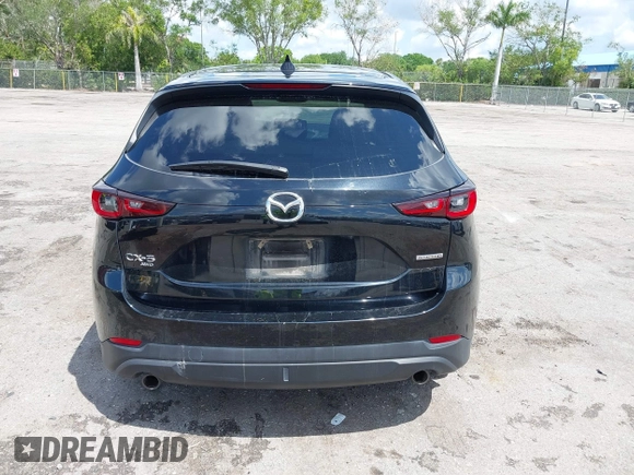 2023 Mazda CX-5 2.5 S Premium Plus Package with VIN JM3KFBEM5P0256652, listed as a IAAI auction lot 41936376 with 31,332 mi miles. Bid and sale history available at carsss.com. Image 16.
