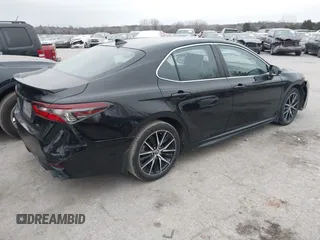 2023 Toyota Camry SE with VIN 4T1G11AK7PU123665, listed as a IAAI auction lot 41142628 with 67,294 mi miles and . Bid and sale history available at DreamBid. Image 4.