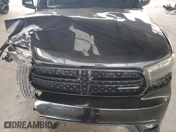 2014 Dodge Durango R/T z VIN 1C4SDHCT8EC476827, wystawiony jako Copart lot #61709275 z przebiegiem 187 327 mil mil oraz Szkoda całkowita • Salvage title. Historia ofert i sprzedaży dostępna na DreamBid. Obrazek 11.