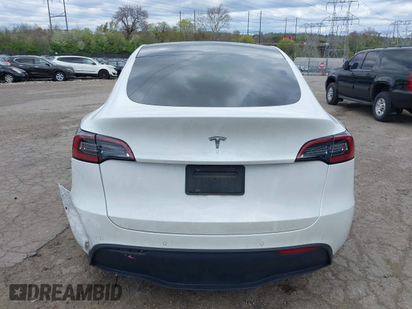2022 Tesla Model Y Long Range z VIN 7SAYGDEE7NF385207, wystawiony jako IAAI lot #42054449 z przebiegiem 52 834 mil mil oraz . Historia ofert i sprzedaży dostępna na DreamBid. Obrazek 16.
