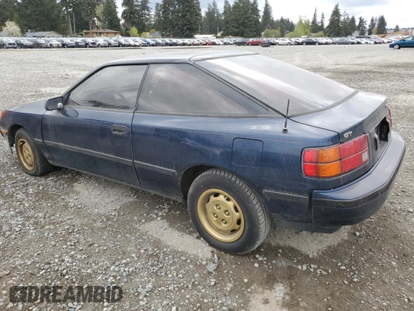 1988 Toyota Celica z VIN JT2ST67L0J7222767, wystawiony jako Copart lot #53647155 z przebiegiem 103 345 mil mil oraz Czysty tytuł • Clean title. Historia ofert i sprzedaży dostępna na DreamBid. Obrazek 2.