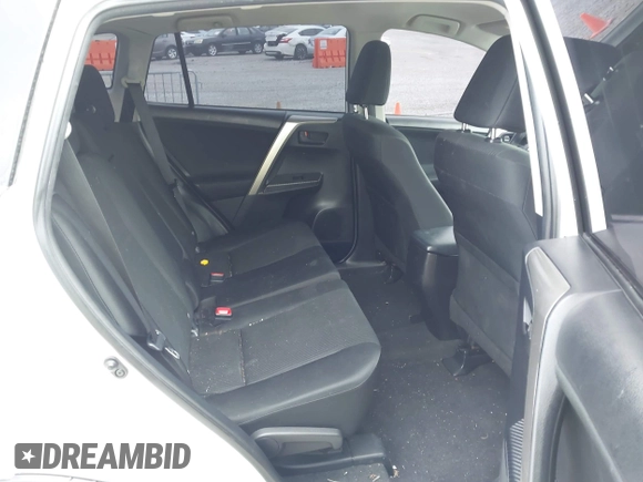2014 Toyota RAV4 LE with VIN JTMBFREV2EJ006965, listed as a IAAI auction lot 41961470 with 194,881 mi miles and . Bid and sale history available at DreamBid. Image 8.