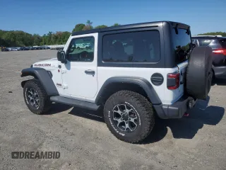 2021 Jeep Wrangler Rubicon with VIN 1C4HJXCG2MW660738, listed as a Copart auction lot 56293735 with 89,681 mi miles and Salvage title. Bid and sale history available at DreamBid. Image 2.