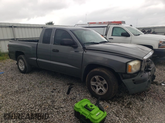 2005 Dodge Dakota SLT with VIN 1D7HE42N65S160583, listed as a Copart auction lot 61182565 with 277,936 mi miles and Salvage title. Bid and sale history available at DreamBid. Image 4.