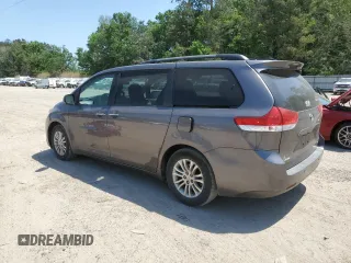 2014 Toyota Sienna XLE with VIN 5TDYK3DC6ES473747, listed as a Copart auction lot 53828345 with 251,390 mi miles and Clean Title. Bid and sale history available at carsss.com. Image 2.