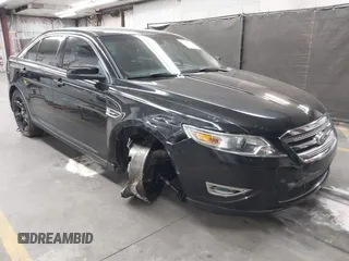 2011 Ford Taurus SHO z VIN 1FAHP2KT1BG118155, wystawiony jako IAAI lot #42689690 z przebiegiem 65 135 mil mil oraz . Historia ofert i sprzedaży dostępna na DreamBid. Obrazek 1.