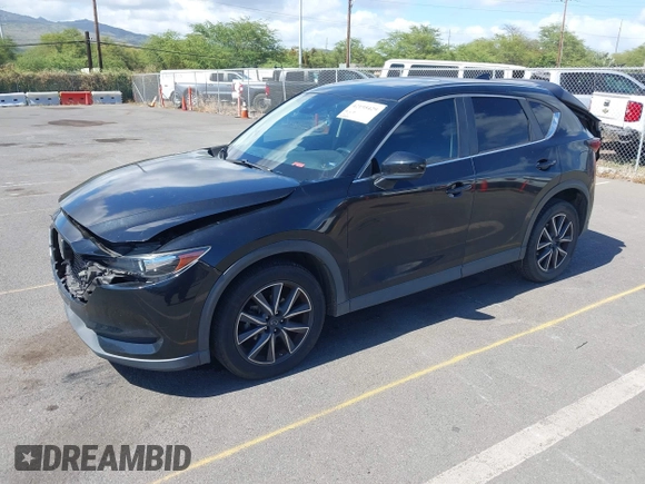 2018 Mazda CX-5 Touring z VIN JM3KFACM5J0309533, wystawiony jako IAAI lot #42195429 z przebiegiem 91 928 mil mil oraz . Historia ofert i sprzedaży dostępna na DreamBid. Obrazek 17.