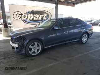2014 Mercedes-Benz E 350 Sport with VIN WDDHF5KB2EA943012, listed as a Copart auction lot 61136245 with 53,502 mi miles and Salvage title. Bid and sale history available at DreamBid. Image 1.