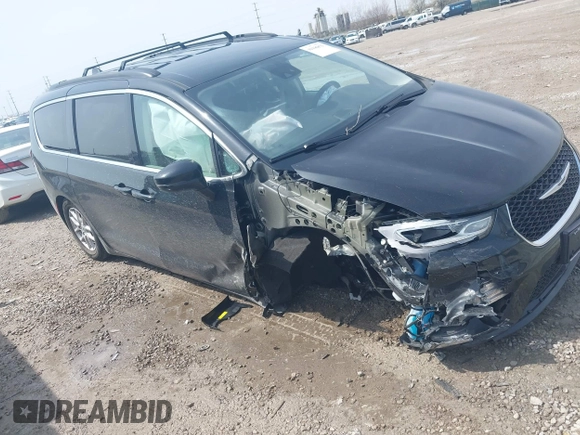 2022 Chrysler Pacifica Touring L with VIN 2C4RC1BG3NR181915, listed as a IAAI auction lot 41946833 with 69,590 mi miles and . Bid and sale history available at DreamBid. Image 1.