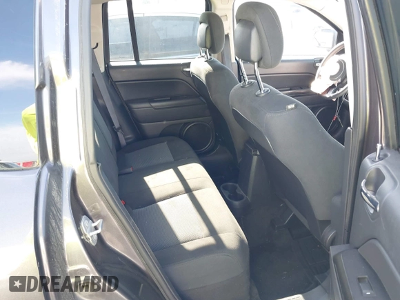 2016 Jeep Compass Sport with VIN 1C4NJDBB0GD511414, listed as a IAAI auction lot 40390327 with 132,120 mi miles. Bid and sale history available at carsss.com. Image 8.