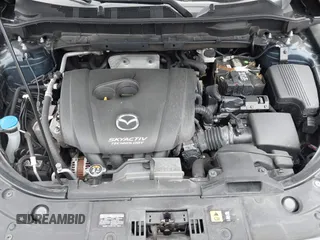 2017 Mazda CX-5 Touring with VIN JM3KFBCL2H0213740, listed as a IAAI auction lot 42165094 with 112,240 mi miles and . Bid and sale history available at DreamBid. Image 10.