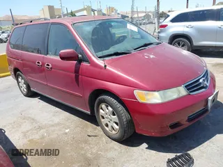 2003 Honda Odyssey EX with VIN 5FNRL18653B131797, listed as a IAAI auction lot 42598574 with 104,064 mi miles and . Bid and sale history available at DreamBid. Image 1.