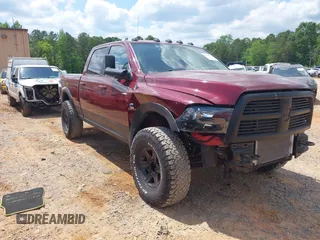 2012 Ram 2500 Laramie z VIN 3C6UD5FL2CG260878, wystawiony jako IAAI lot #42231366 z przebiegiem 281 335 mil mil oraz . Historia ofert i sprzedaży dostępna na DreamBid. Obrazek 1.