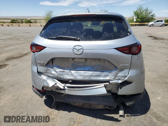 2018 Mazda CX-5 Grand Touring with VIN JM3KFBDM3J0319157, listed as a Copart auction lot 53891095 with 133,189 mi miles and Salvage Title. Bid and sale history available at DreamBid. Image 6.