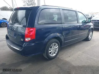 2015 Dodge Grand Caravan SXT Plus with VIN 2C4RDGCG7FR649032, listed as a IAAI auction lot 41825774 with 128,521 mi miles. Bid and sale history available at carsss.com. Image 4.