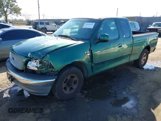 1999 Ford F-150 XL with VIN 1FTRX17L3XNC30010, listed as a IAAI auction lot 41632812 with 268,884 mi miles. Bid and sale history available at carsss.com. Image 2.