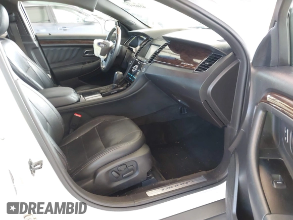 2015 Ford Taurus Limited with VIN 1FAHP2J81FG118224, listed as a IAAI auction lot 42402947 with 142,885 mi miles and . Bid and sale history available at DreamBid. Image 5.