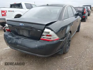 2008 Ford Taurus SEL with VIN 1FAHP24W28G108122, listed as a IAAI auction lot 41546652 with 219,774 mi miles. Bid and sale history available at carsss.com. Image 6.
