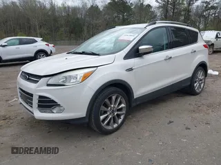 2016 Ford Escape SE with VIN 1FMCU0GX0GUA95789, listed as a IAAI auction lot 41829818 with 84,431 mi miles. Bid and sale history available at carsss.com. Image 2.