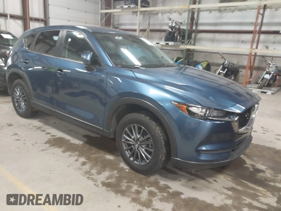 2019 Mazda CX-5 Touring with VIN JM3KFBCM1K0584369, listed as a IAAI auction lot 41657765 with 77,934 mi miles. Bid and sale history available at carsss.com. Image 1.