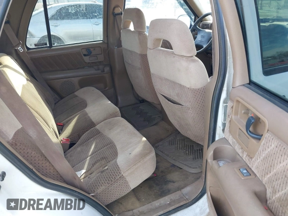 1996 GMC Jimmy SL z VIN 1GKDT13W8T2522192, wystawiony jako IAAI lot #41439548 z przebiegiem 262 152 mil mil oraz . Historia ofert i sprzedaży dostępna na DreamBid. Obrazek 8.