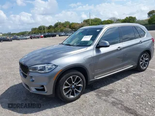 2016 BMW X5 xDrive40e with VIN 5UXKT0C58G0S75938, listed as a IAAI auction lot 42021138 with 97,426 mi miles and . Bid and sale history available at DreamBid. Image 2.