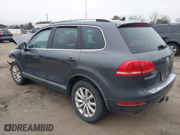 2012 Volkswagen Touareg Sport z VIN WVGEF9BP5CD011717, wystawiony jako IAAI lot #41787614 z przebiegiem 138 127 mil mil oraz . Historia ofert i sprzedaży dostępna na DreamBid. Obrazek 3.