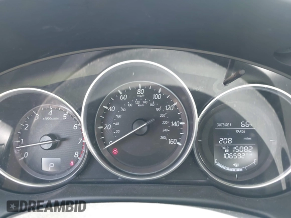 2016 Mazda CX-5 Grand Touring with VIN JM3KE4DY0G0632693, listed as a IAAI auction lot 42123142 with 106,592 mi miles. Bid and sale history available at carsss.com. Image 7.