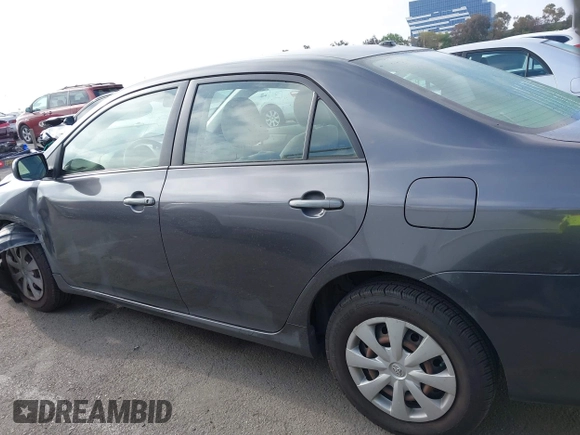 2011 Toyota Corolla L with VIN JTDBU4EE7B9162022, listed as a IAAI auction lot 42066643 with 124,384 mi miles. Bid and sale history available at carsss.com. Image 15.