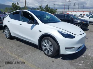2023 Tesla Model Y Long Range with VIN 7SAYGAEE5PF855834, listed as a IAAI auction lot 41943491 with 34,480 mi miles. Bid and sale history available at carsss.com. Image 1.