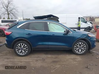 2020 Ford Escape Titanium with VIN 1FMCU9J98LUC00068, listed as a IAAI auction lot 41843755 with 42,525 mi miles and . Bid and sale history available at DreamBid. Image 13.